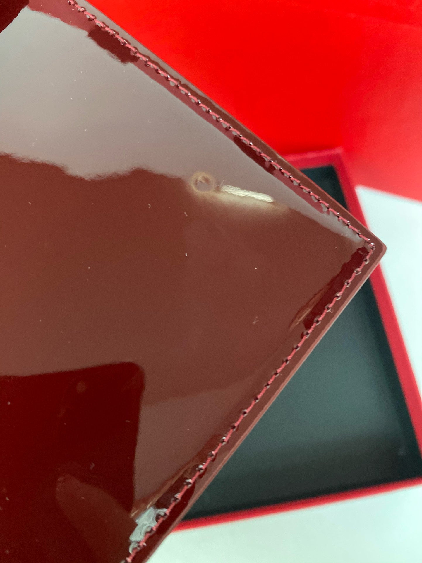 Yves Saint Laurent Uptown Pouch In Patent Leather