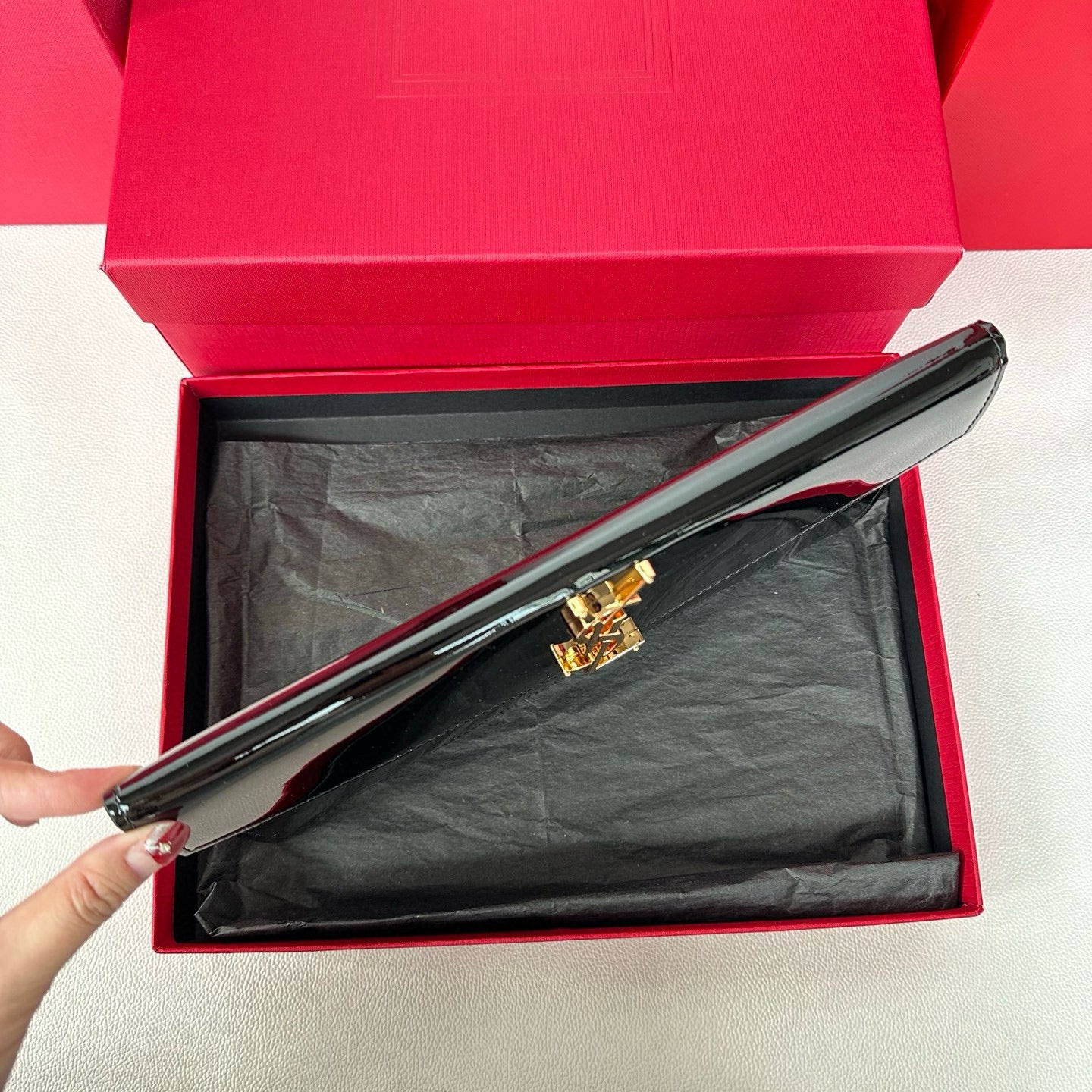 Yves Saint Laurent Uptown Pouch In Patent Leather