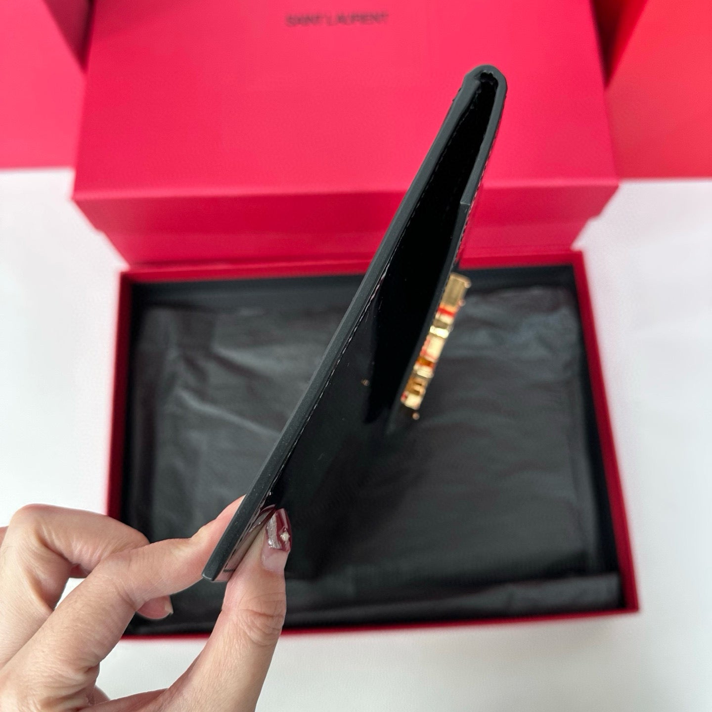 Yves Saint Laurent Uptown Pouch In Patent Leather