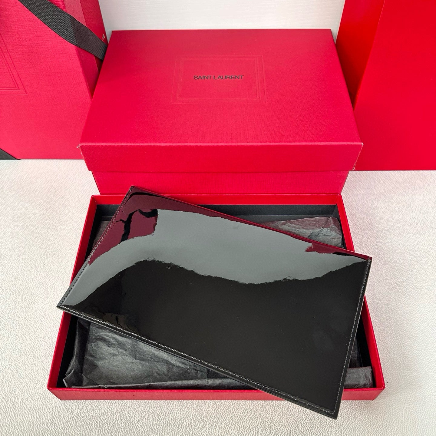 Yves Saint Laurent Uptown Pouch In Patent Leather