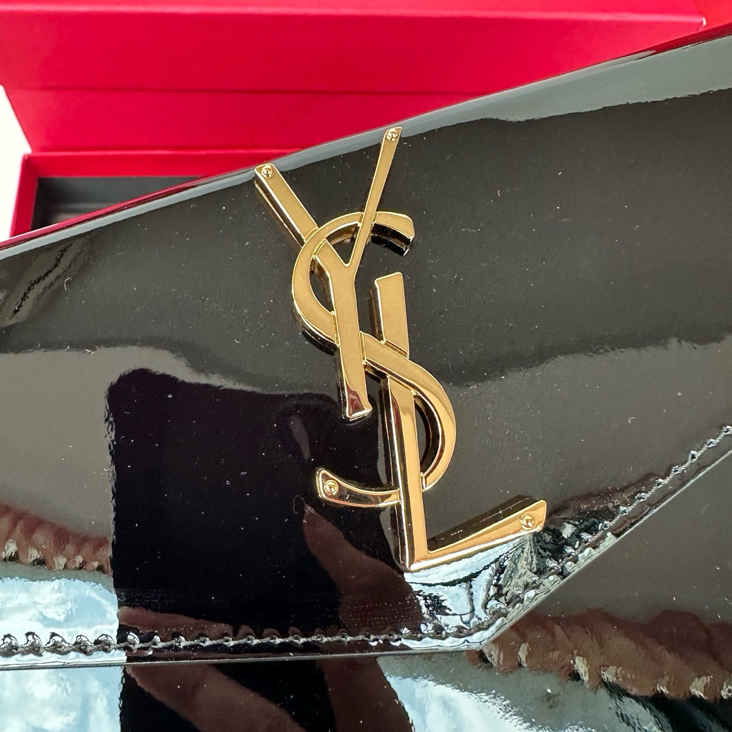 Yves Saint Laurent Uptown Pouch In Patent Leather